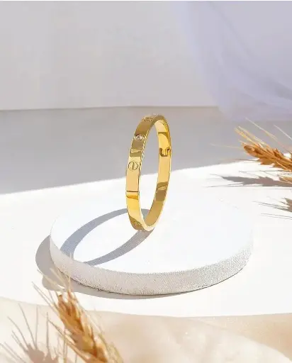 Radiant Embrace – Gold-Tone Love Bracelet